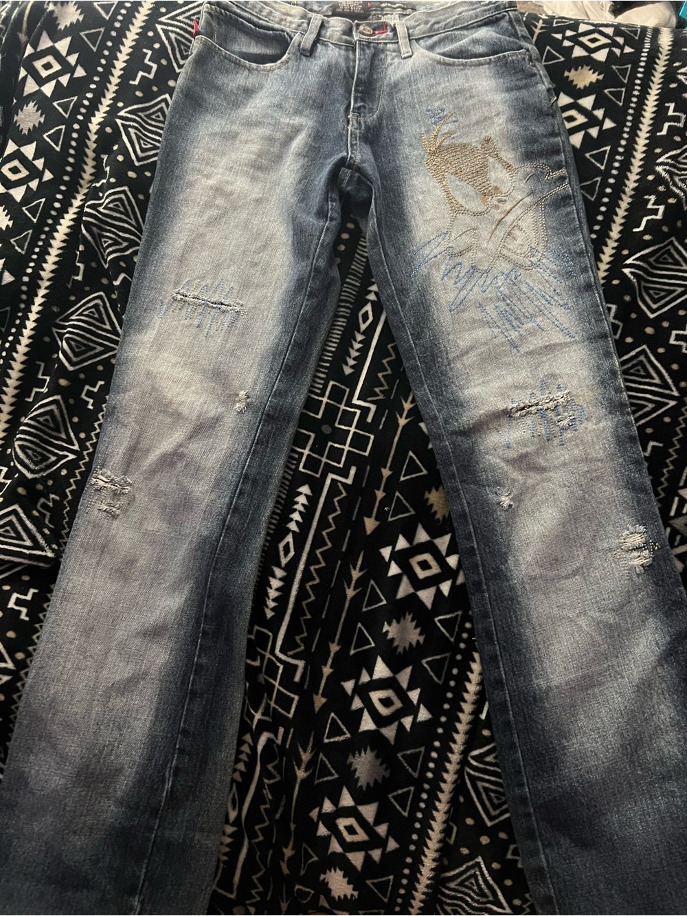 Women’s Bootcut Distressed Light Blue Jeans